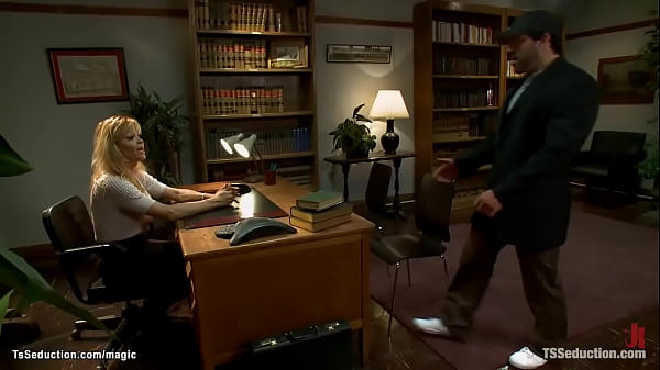 Blond TS anal fucks tied man in office