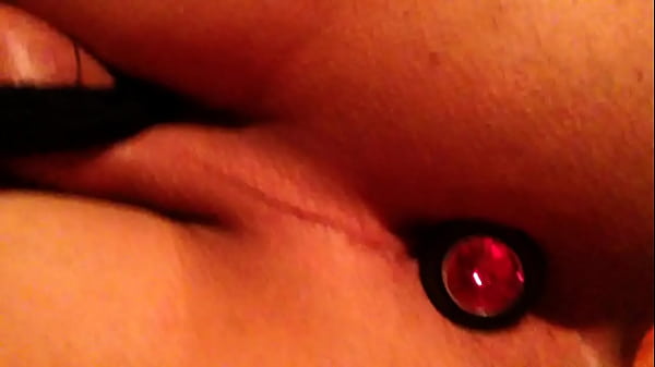 Sissy shows off her butt with jeweled buttplug