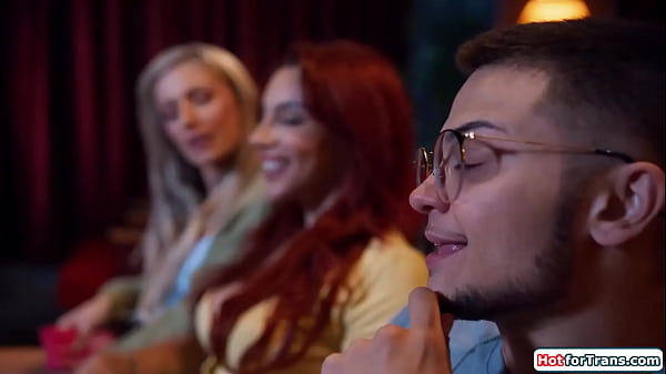 Two big tits shemales fuck a trans mans pussy at the cinema