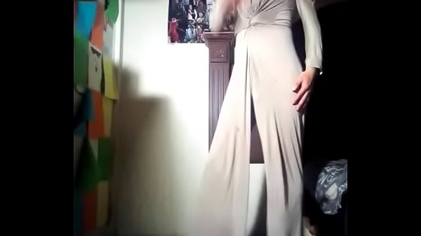 SEXY TV WHORE IN HIGH HEELS AND BEIGE PALAZZO